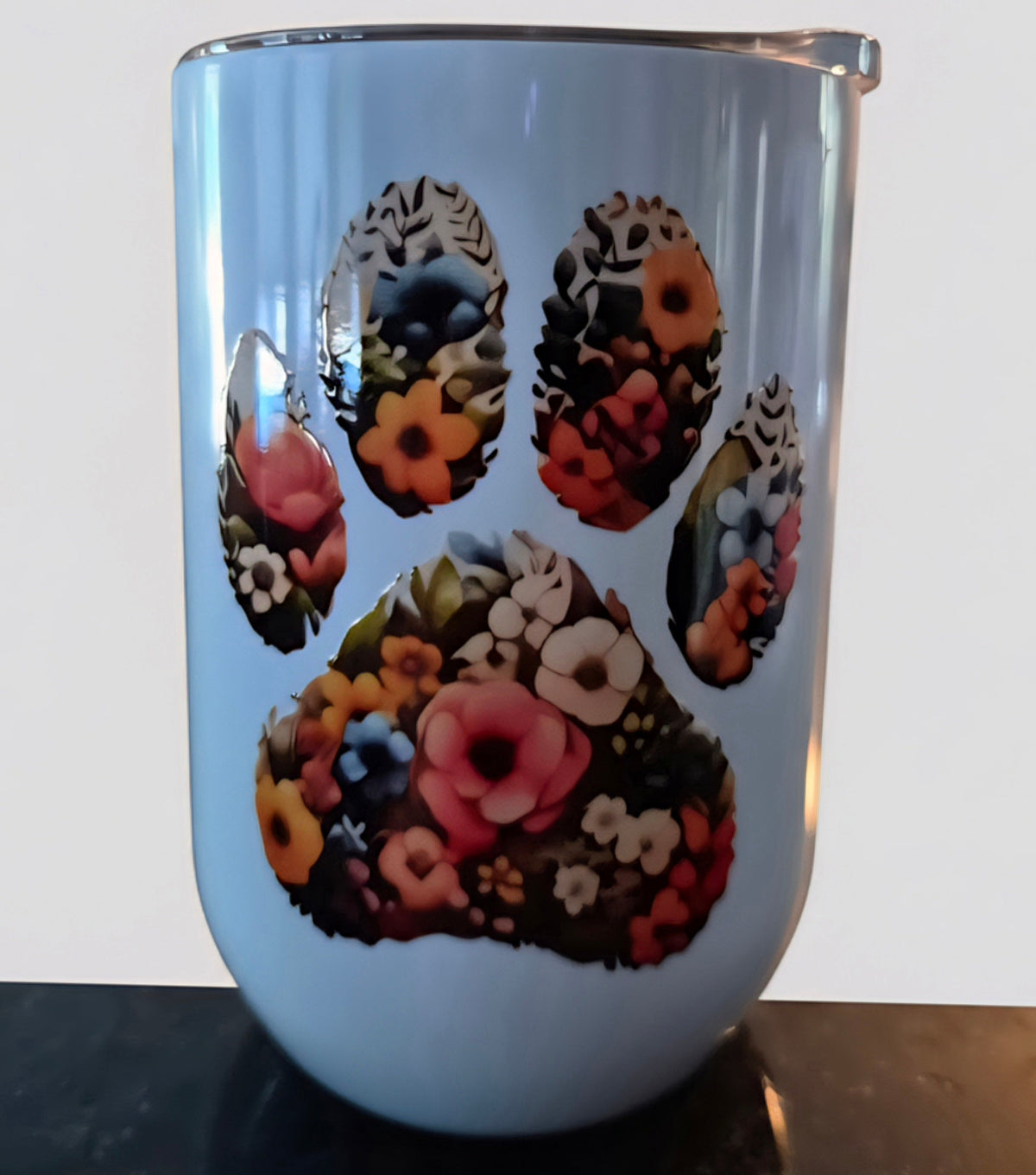 White wine tumbler with a floral-patterned paw print design