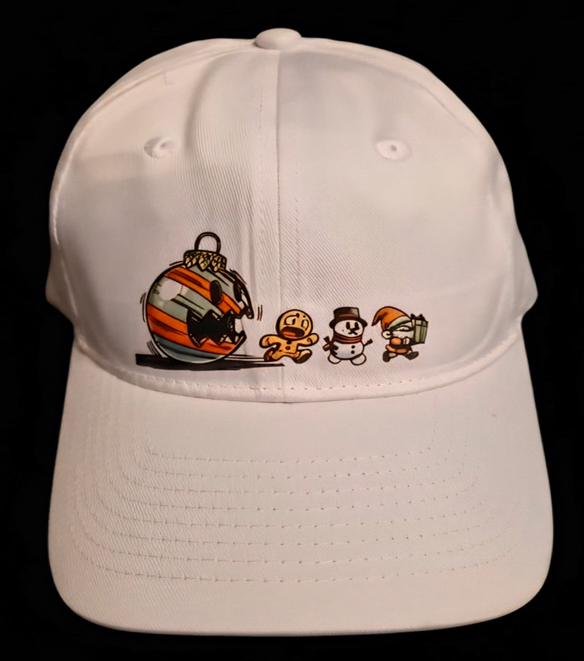 White cap with a colorful holiday ornament and festive character lineup