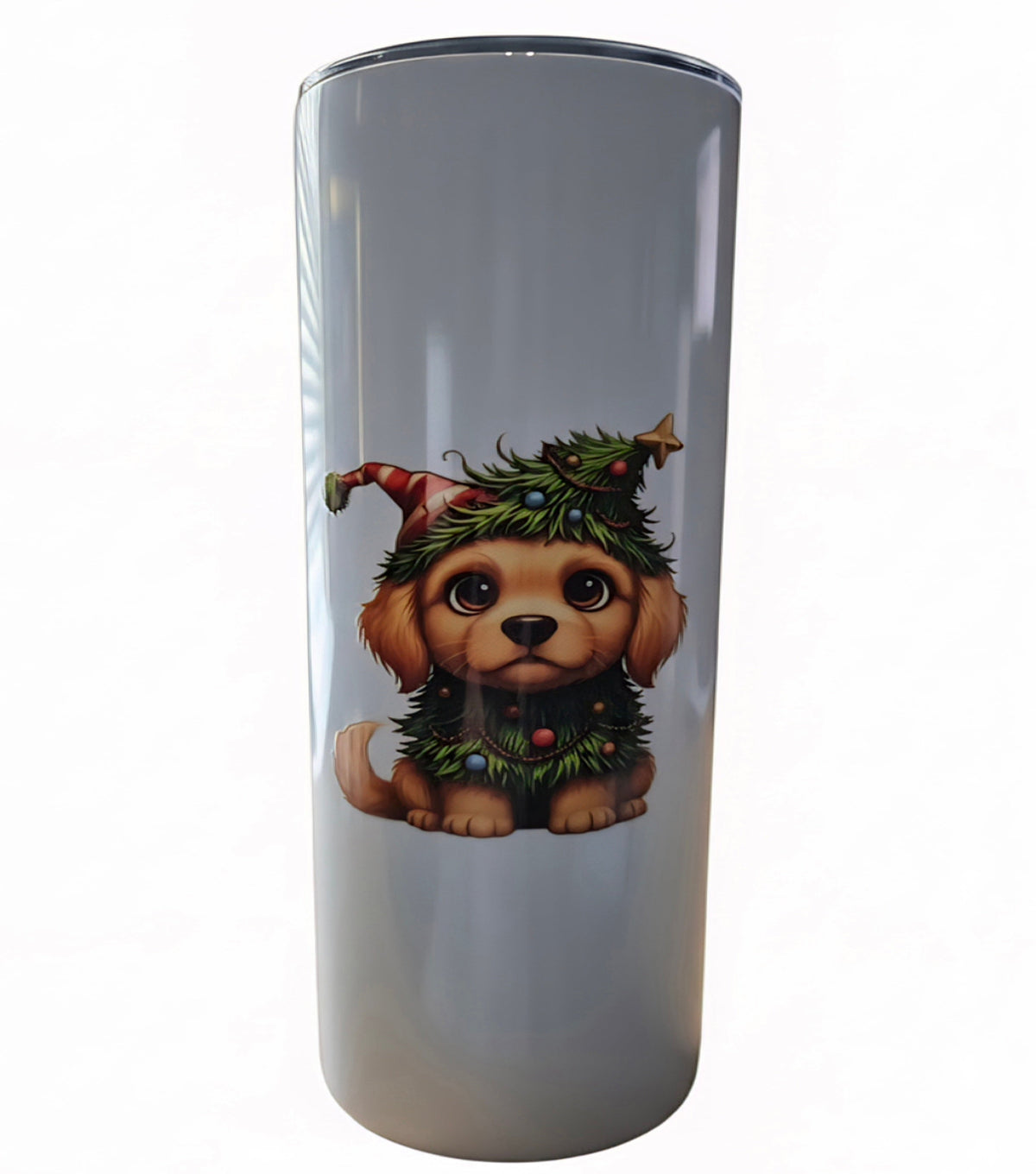 Light-colored tumbler featuring a brown puppy in Christmas greenery with ornaments, a Santa hat, and a gold star
